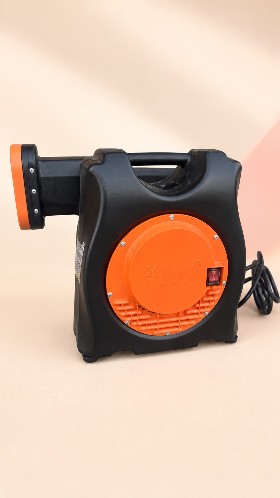 Black and orange 1.5 HP inflatable blower available to rent from Weekendaz in Jamaica