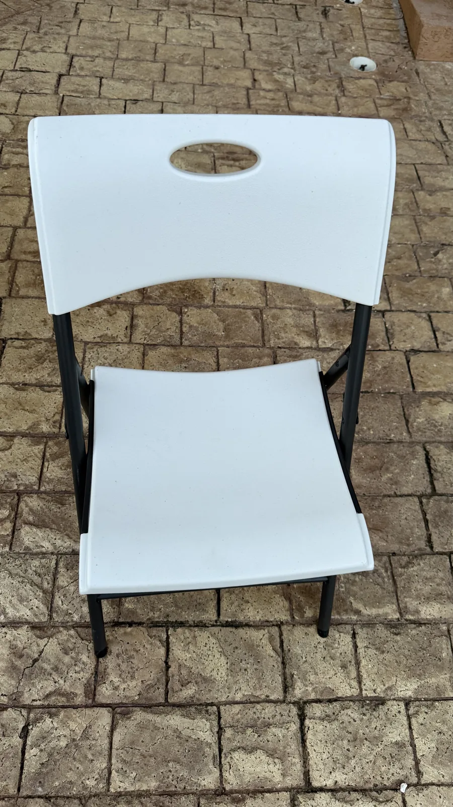White folding chair available from Weekendaz