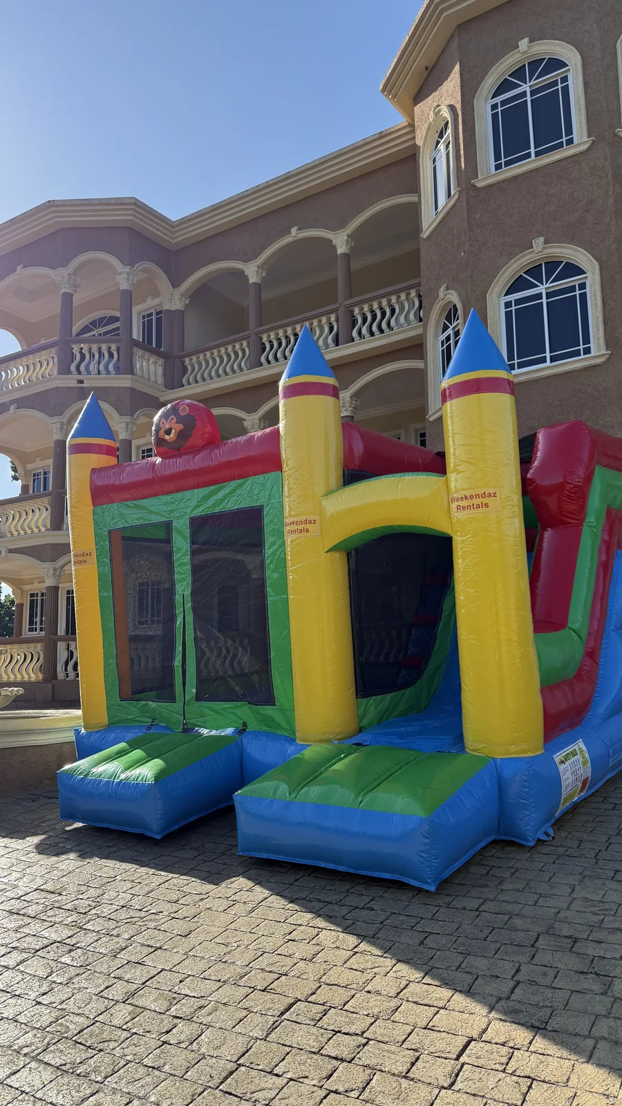 Three-quarter view of the larger Weekendaz bouncer and slide