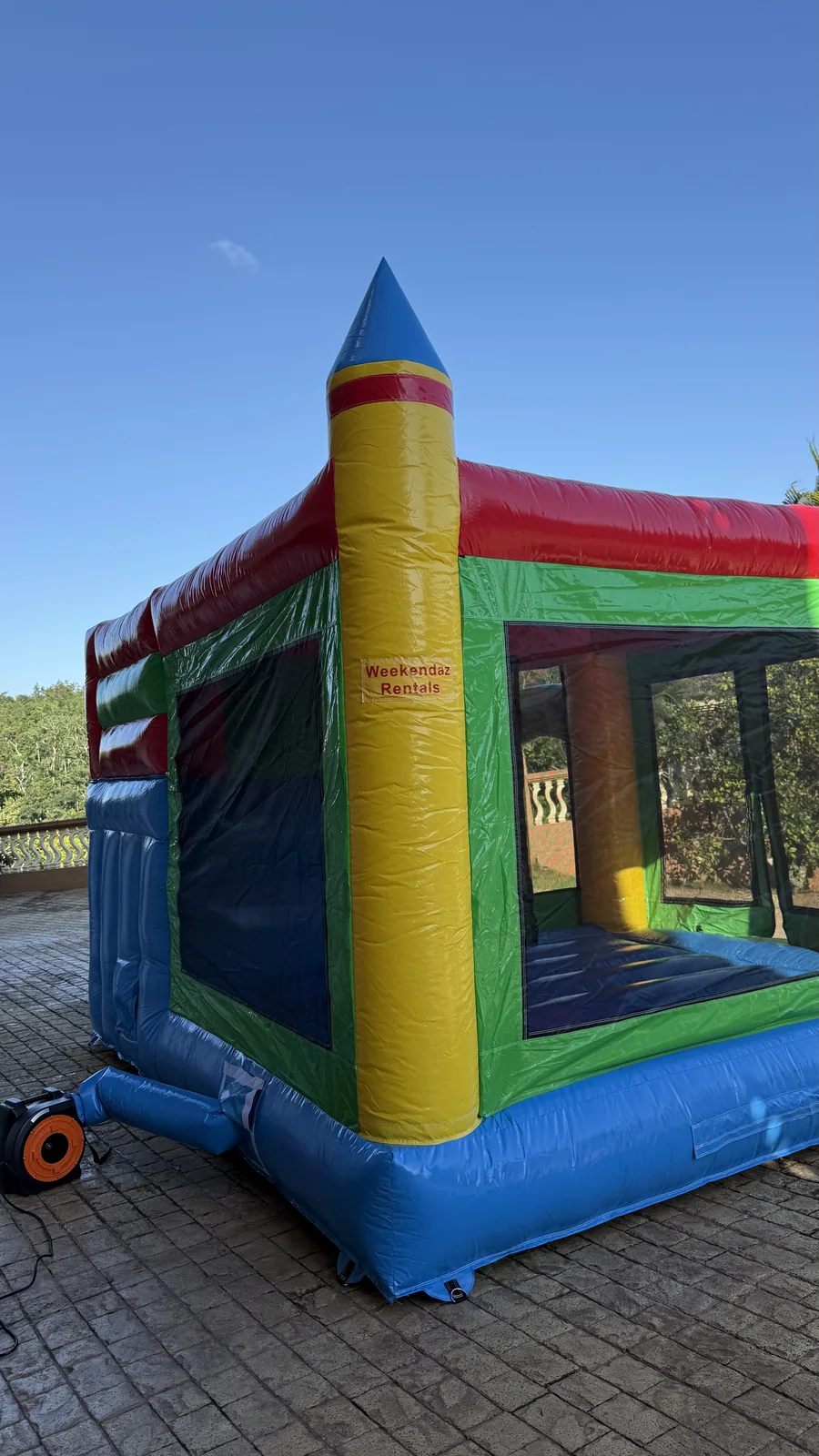 Rear view showing the netted bounce area of the larger inflatable