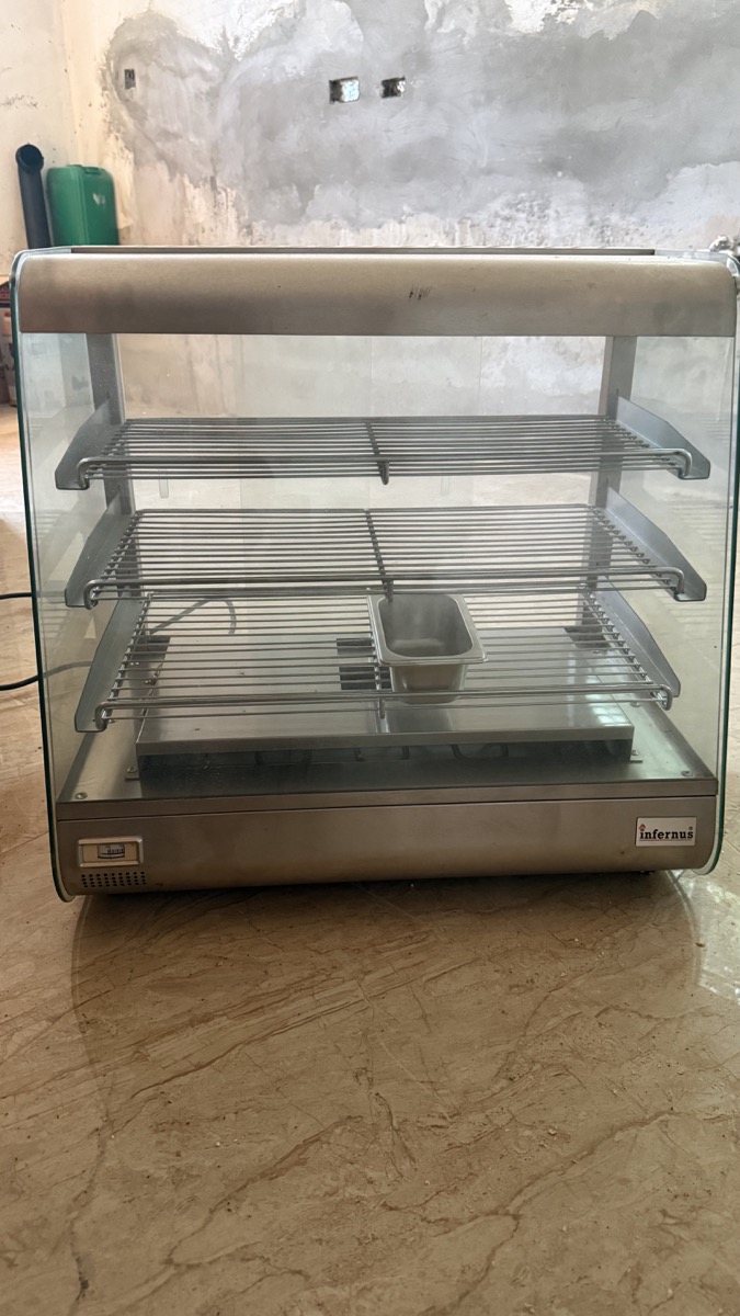 Full-height view of the Weekendaz stainless-steel heated patty display cabinet