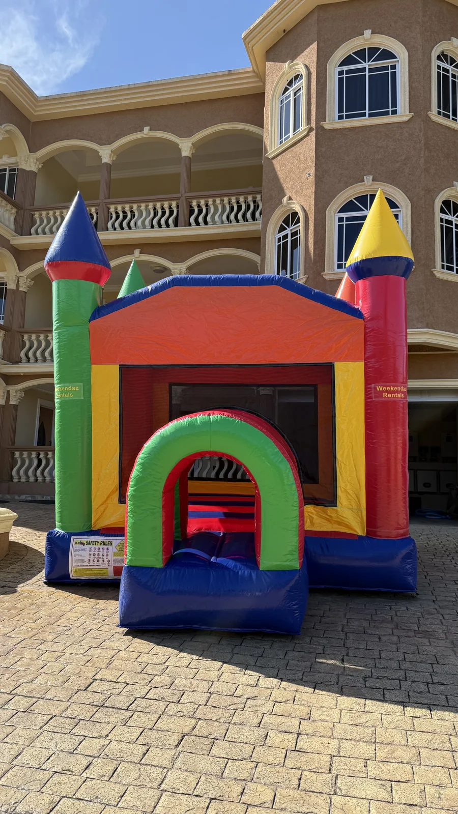 Front view of the Weekendaz 12 by 12 foot castle bouncer