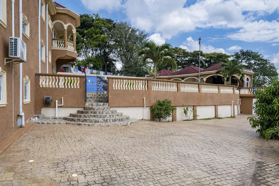 The main entrance to the pool area. You can also see our June plum and Otaheite Apple (Jamaican Apple)Trees.