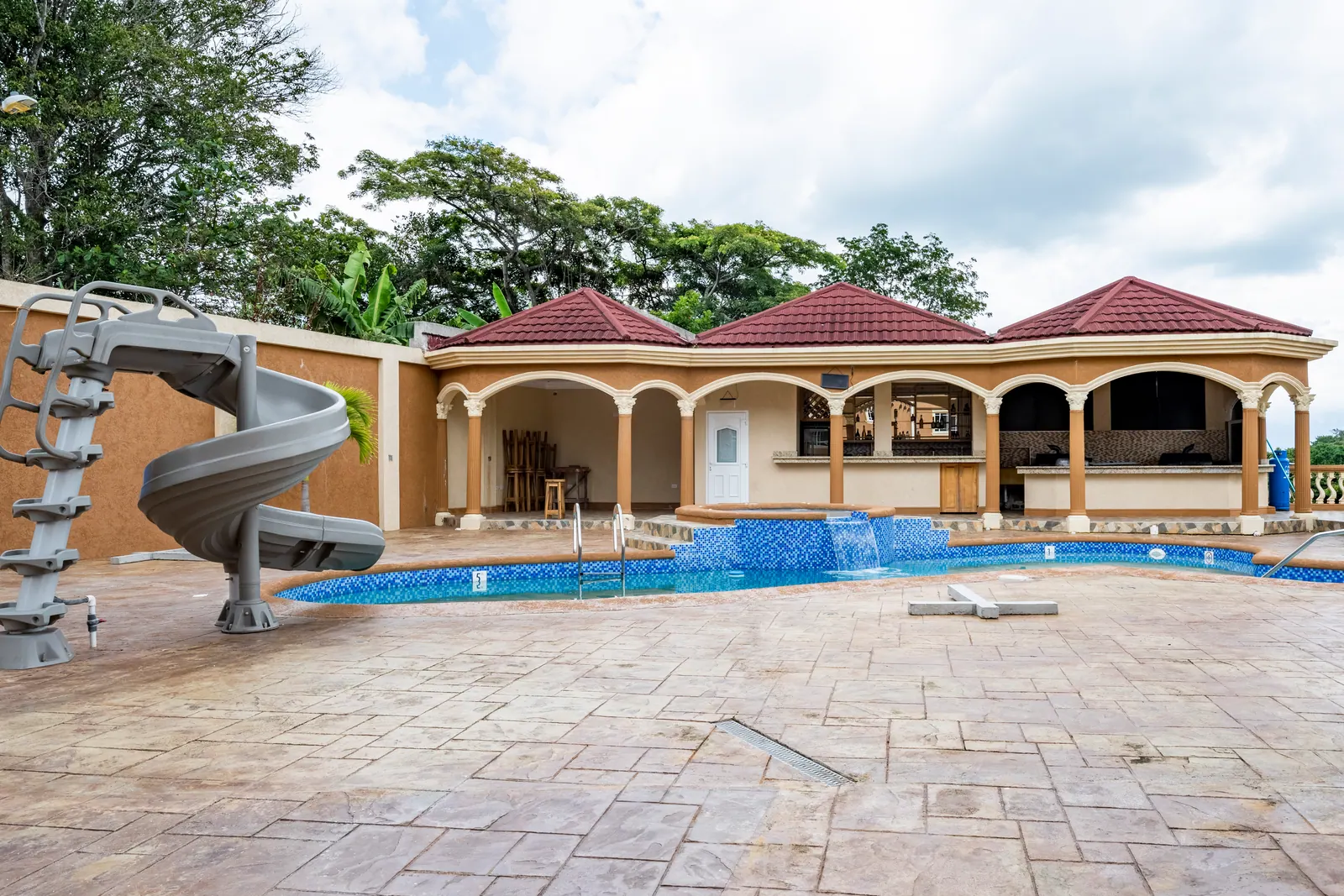 The private pool and spiral water slide