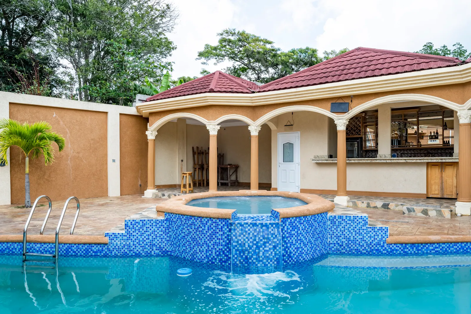 The private pool and covered pavilion at Weekendaz Villa