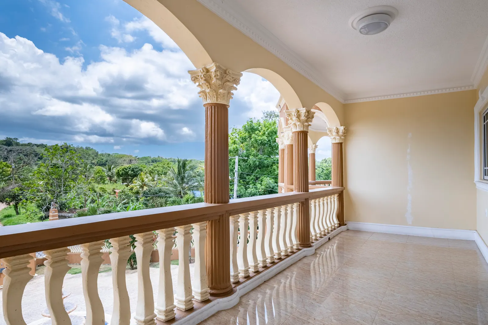 Private balcony overlooking the green Jamaican landscape