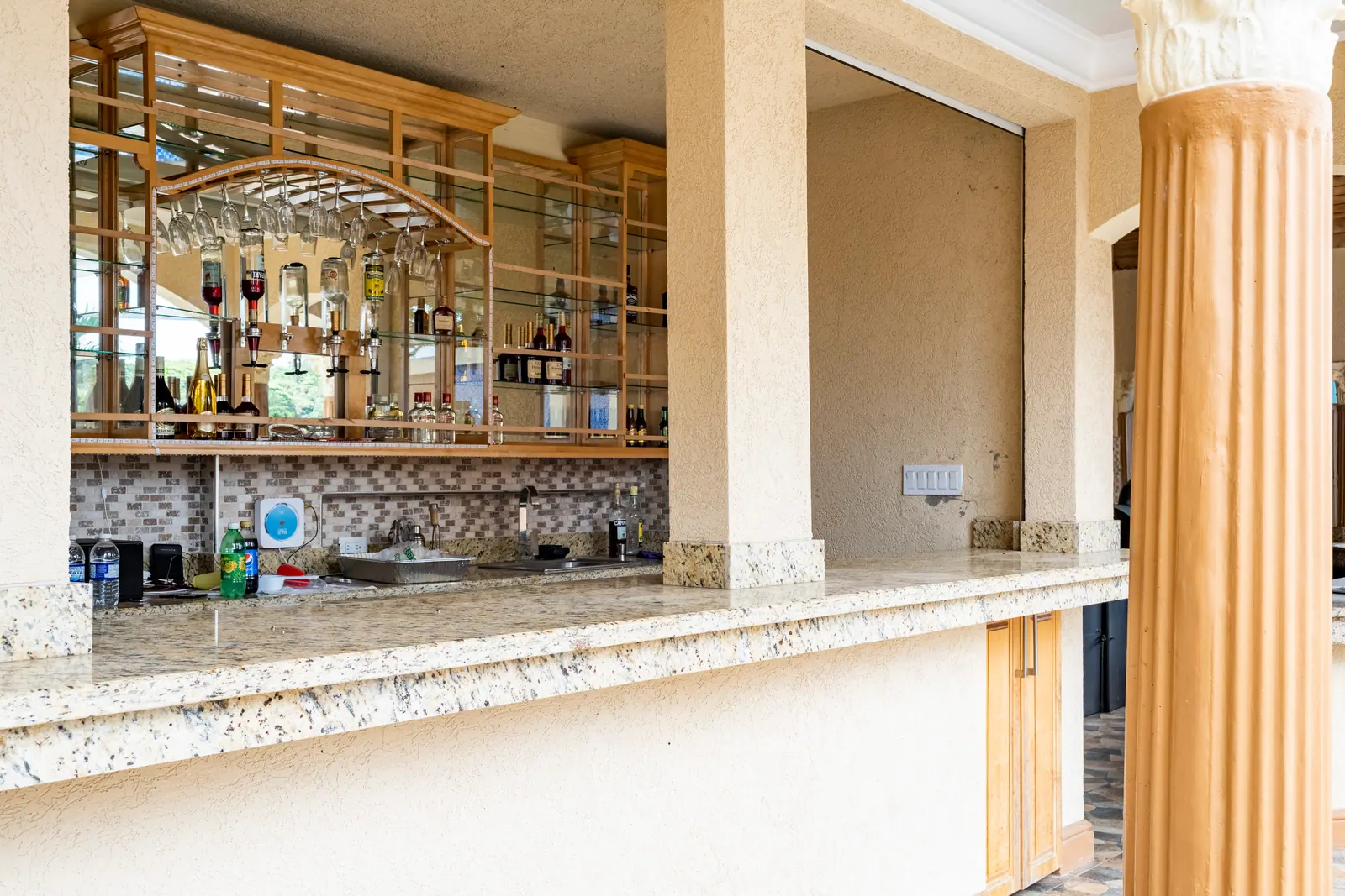 Mirrored private bar inside the villa